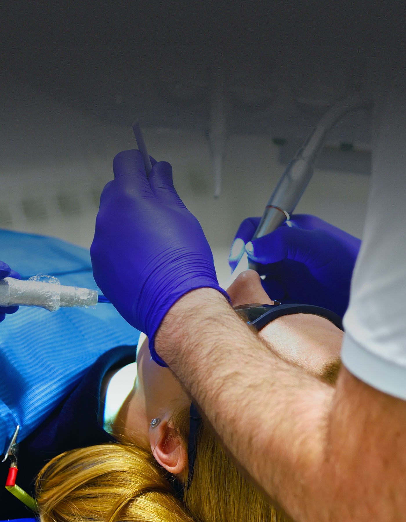Patient having oral surgery treatment